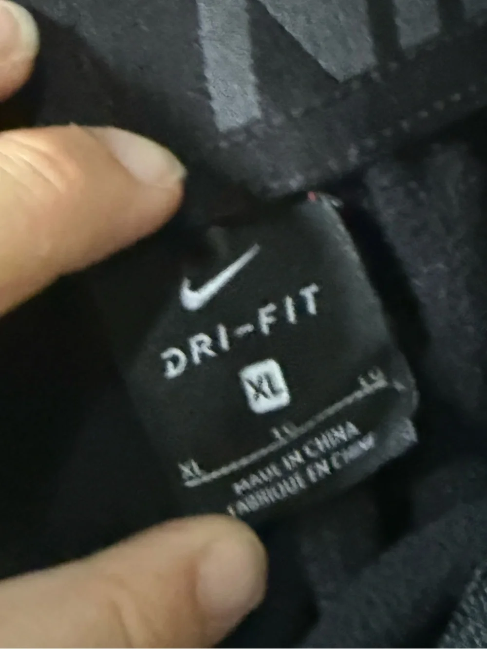 Nike Kids' Black Dri-FIT Athletic Pants with White Swoosh - Size XL
